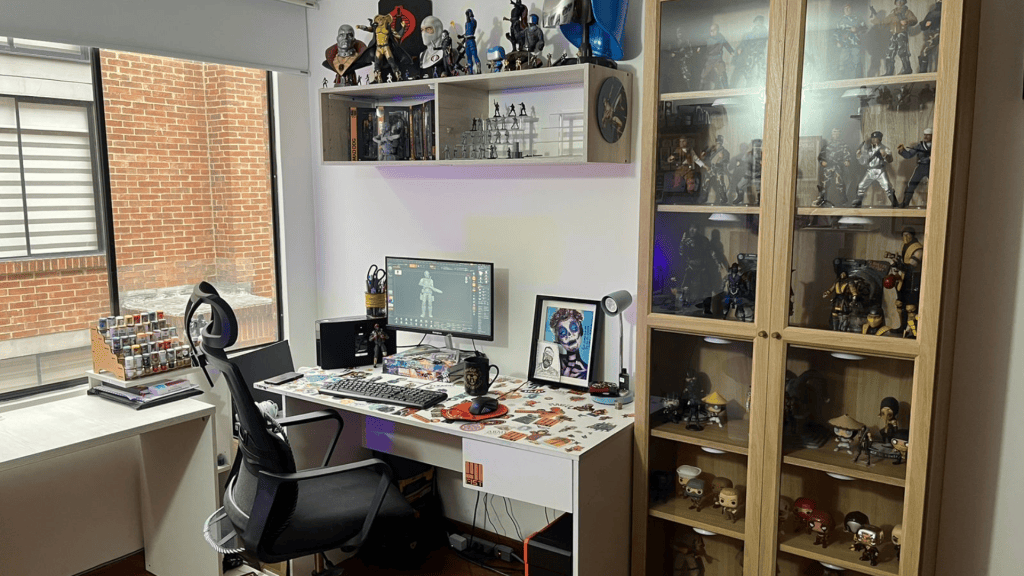 Esteban Cifuentes action figures and workstation